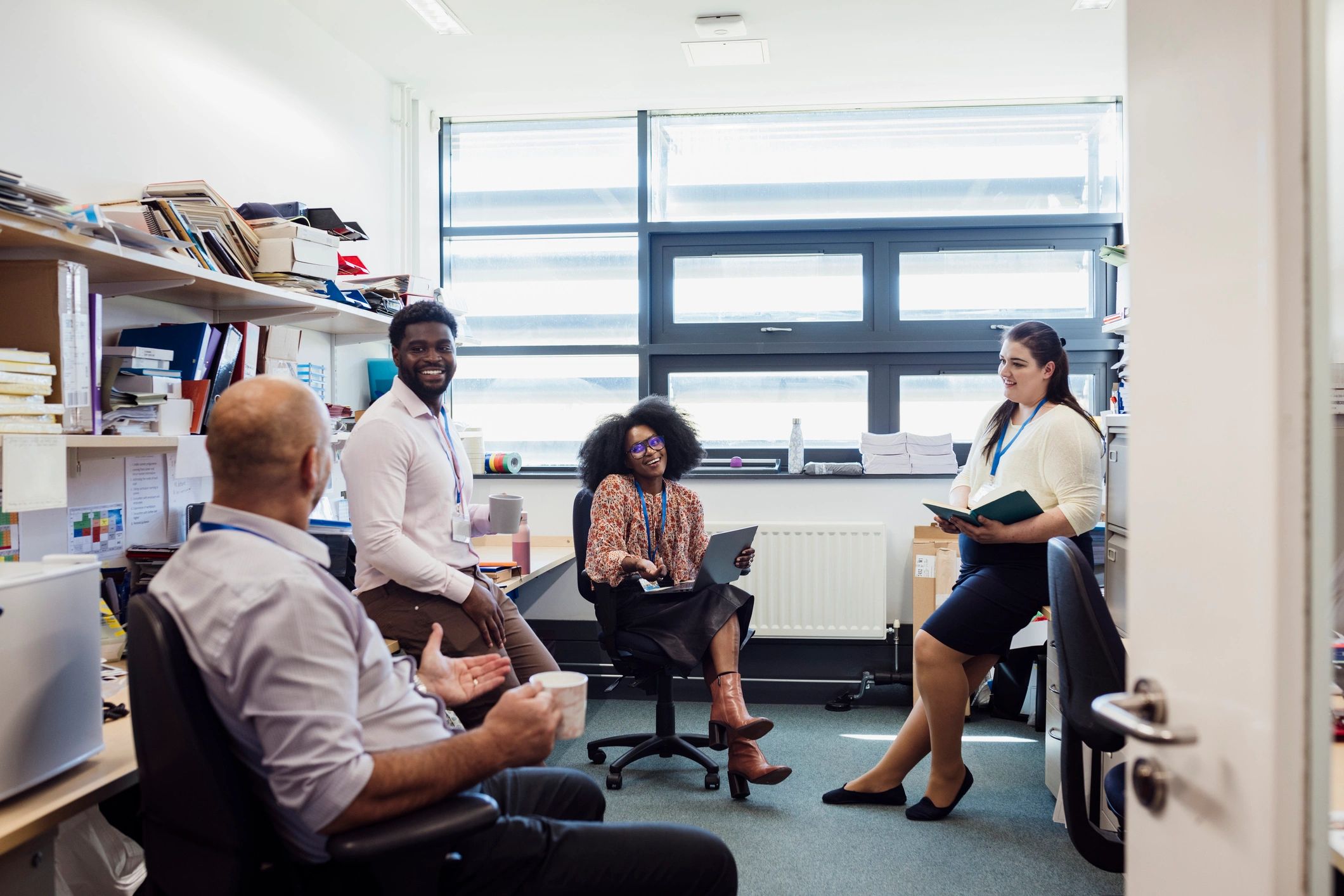 Community leaders meeting together in a collaborative workspace