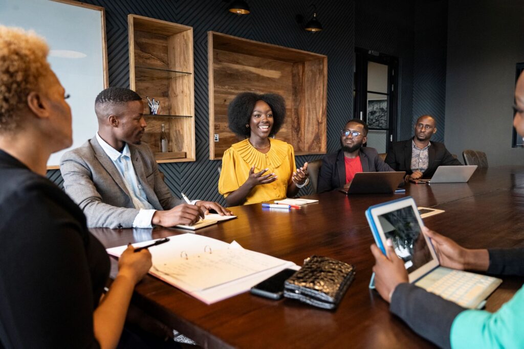 Enthusiastic businesswoman sharing ideas in meeting